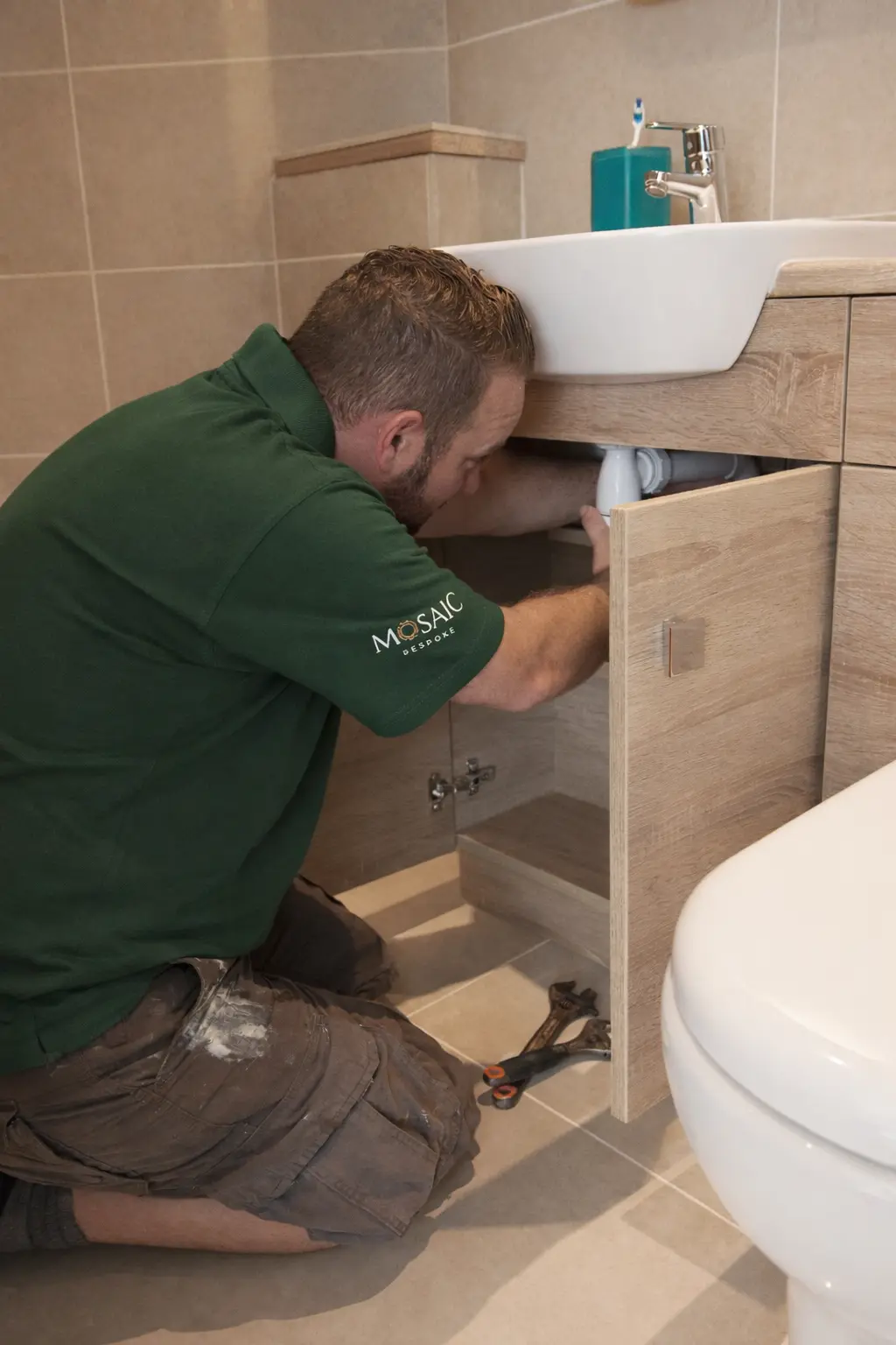 Mosaic Bespoke plumber fitting a bathroom vanity unit